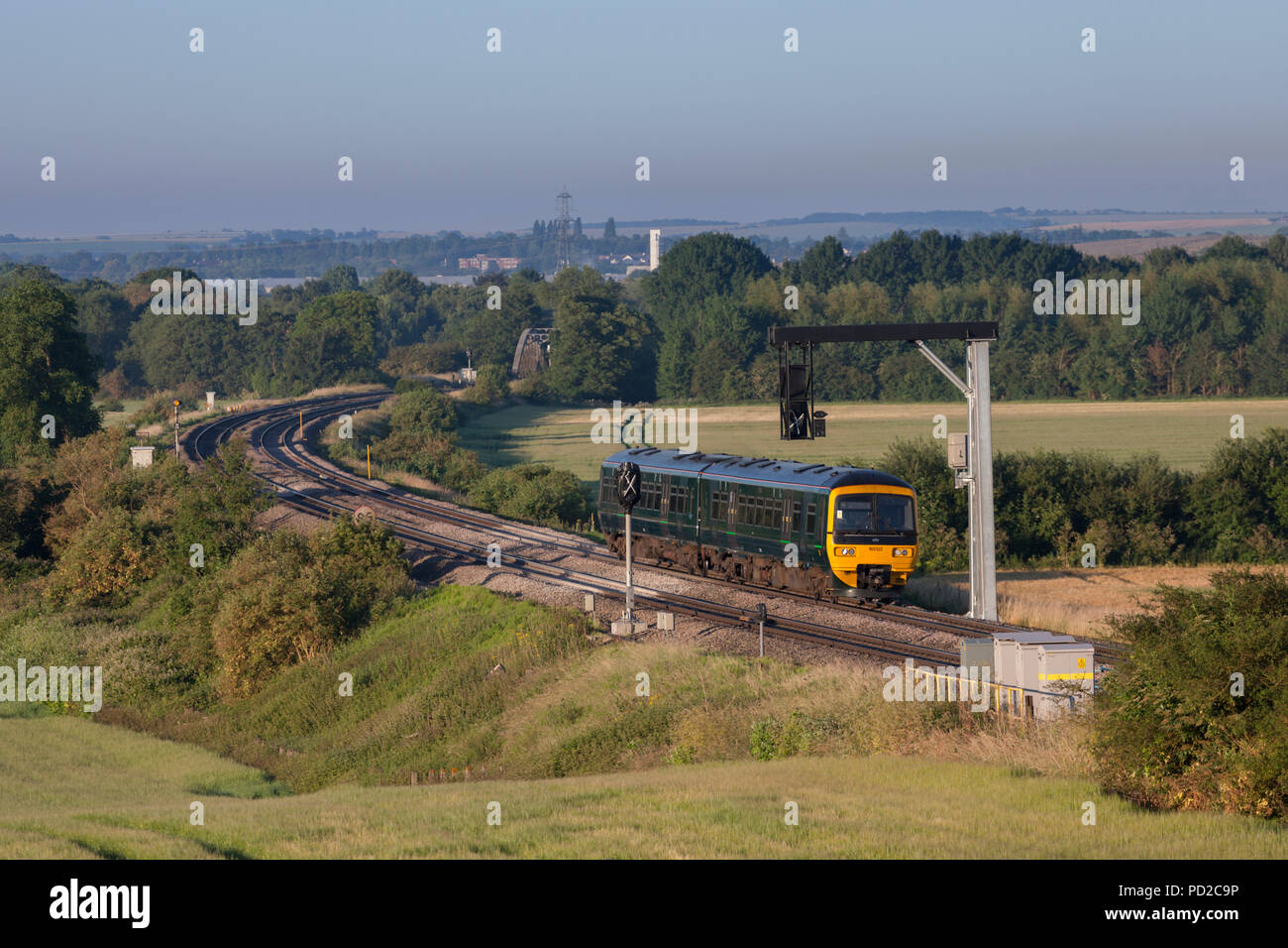 A First Great Western railway class 165 turbo train passing  Culham (north of Didcot) with an early morning  stopping train Stock Photo