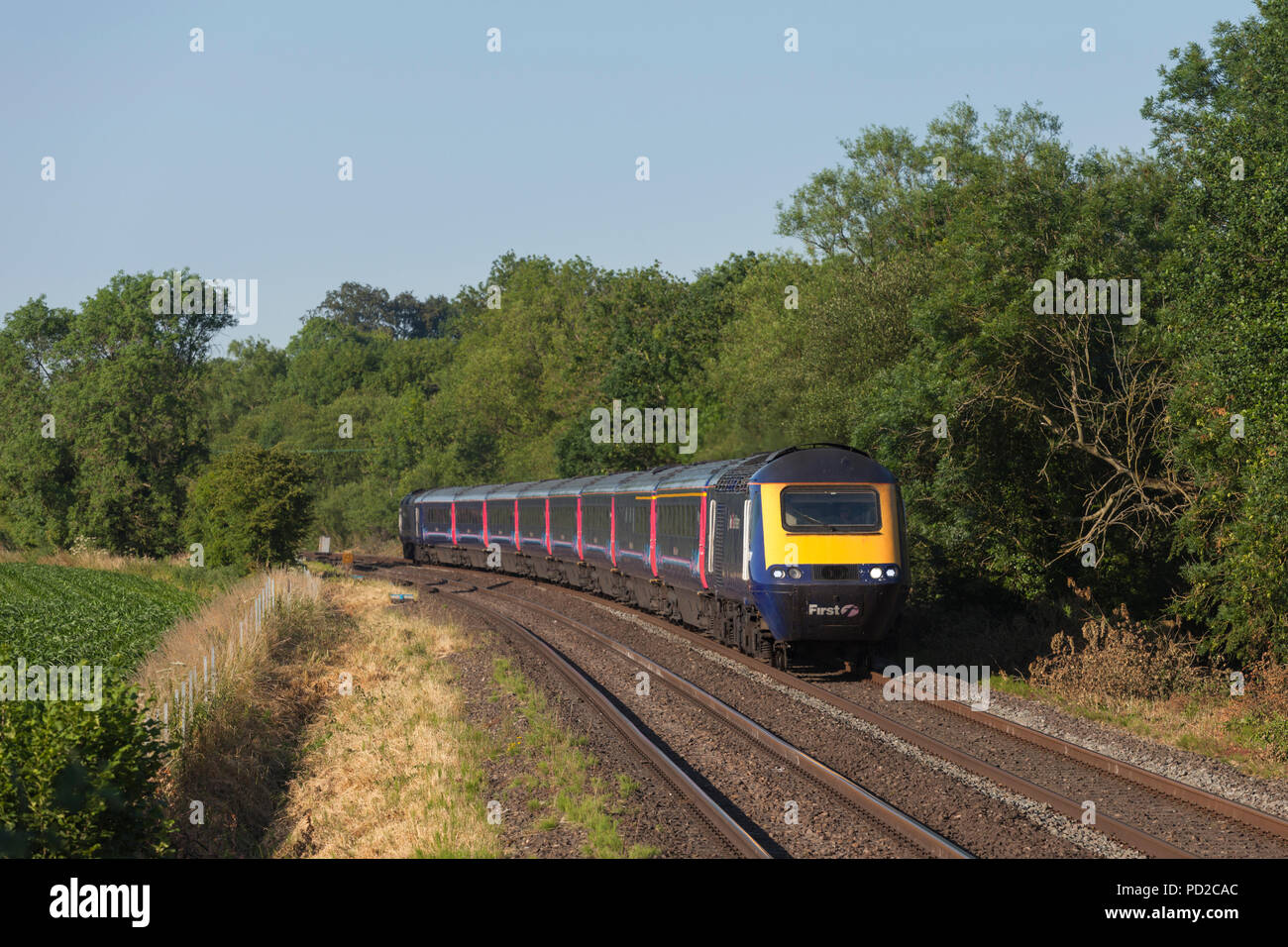 A First Great Western Railway high speed train ( intercity 125) at  Great Bedwyn with a Paddington to Penzance train Stock Photo
