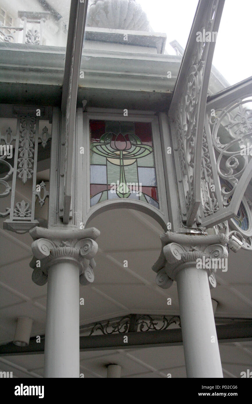 Architectural detail Stained Glass Window and Pillars, Raffles Hotel