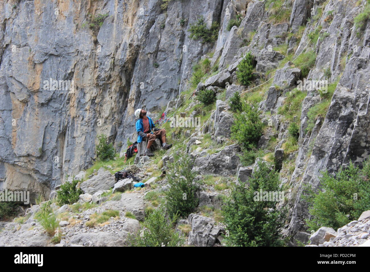 Rock climber in the spanish Pyrenees mountain range in the France