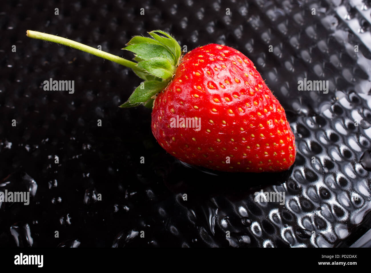 A view of a juicy, sweet and ripe strawberry fruit Stock Photo - Alamy