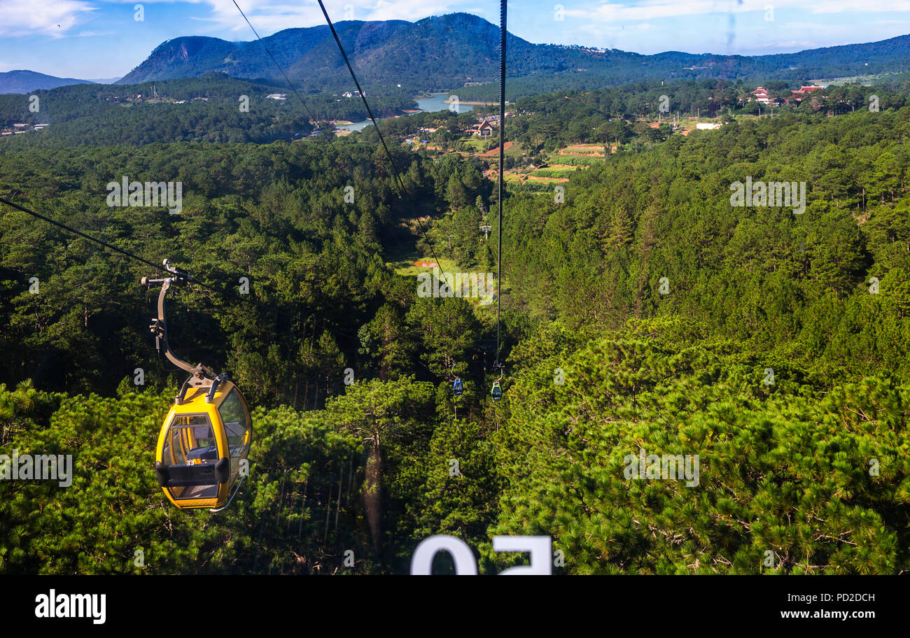 POV looking out the window of a cable car with a wide view of another ...