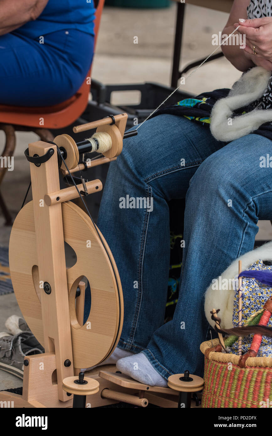Spinning wheel spindle and treadle making yarn for sewing Stock Photo Alamy