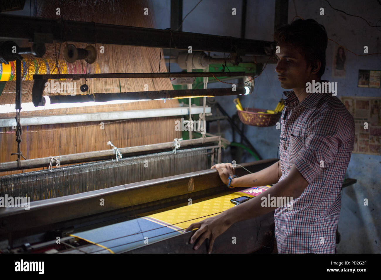 Silk spinning in the weavers district of Varanasi, Uttar