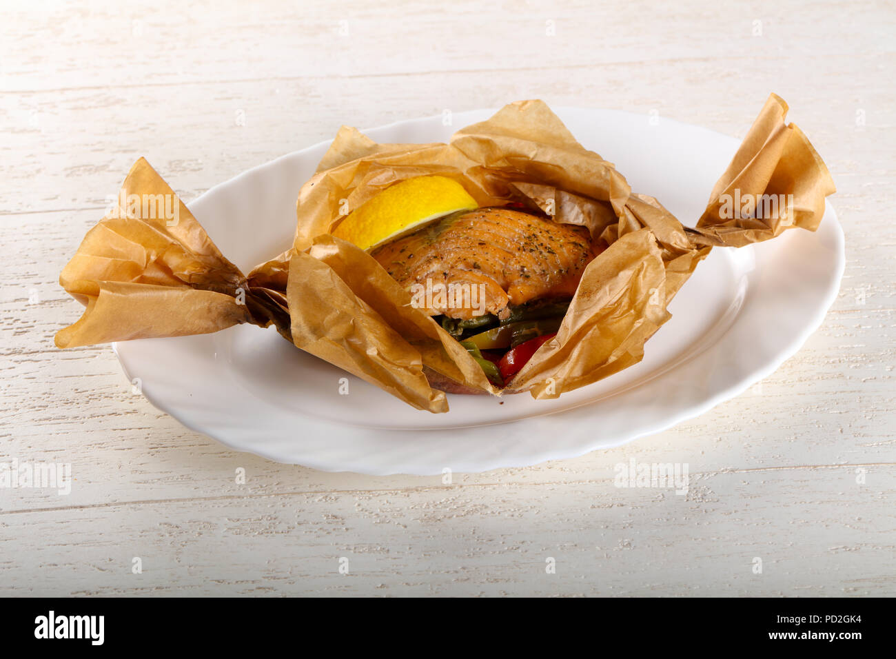 Baked salmon with vegetables Stock Photo - Alamy