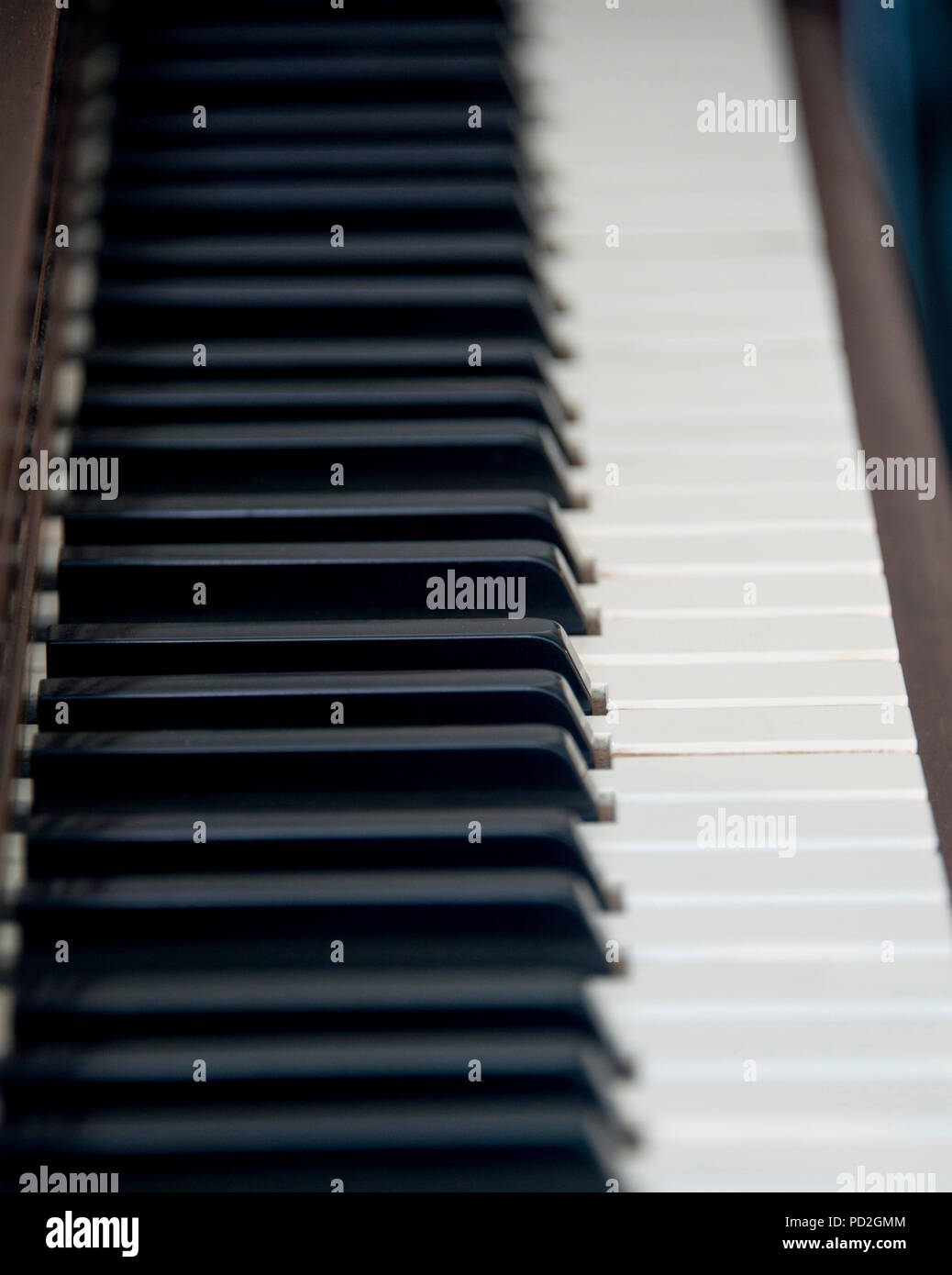 Black and white keys wooden upright piano Stock Photo Alamy