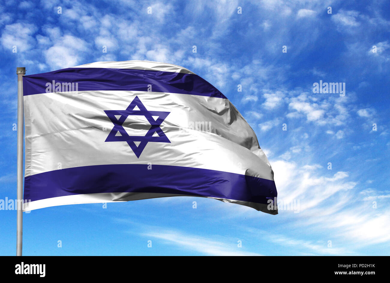 National flag of Israel on a flagpole in front of blue sky Stock Photo ...