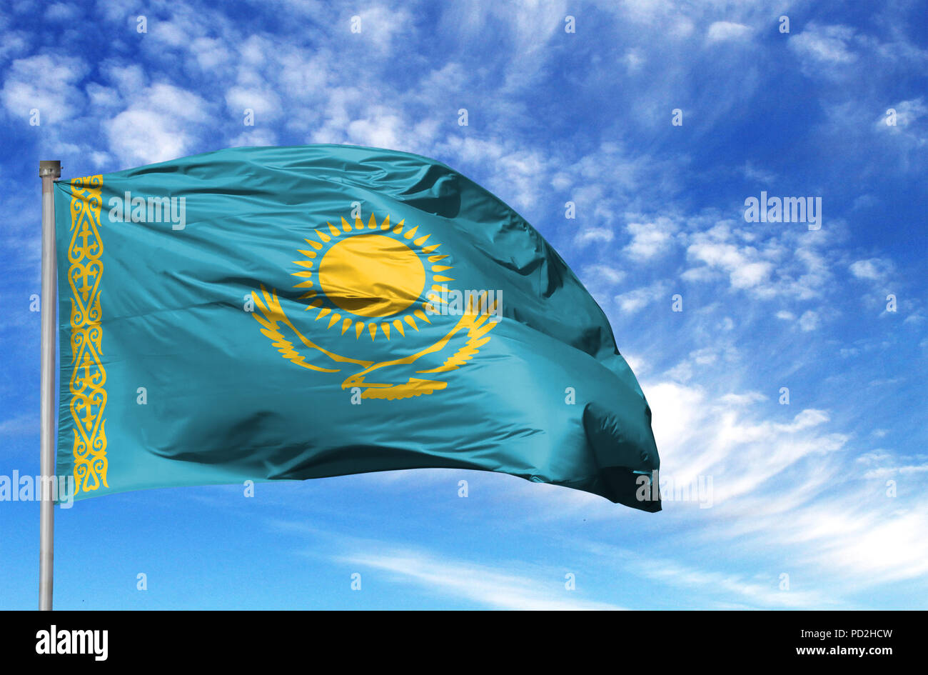 Kazakhstan Flag on a Flagpole · Free Stock Photo