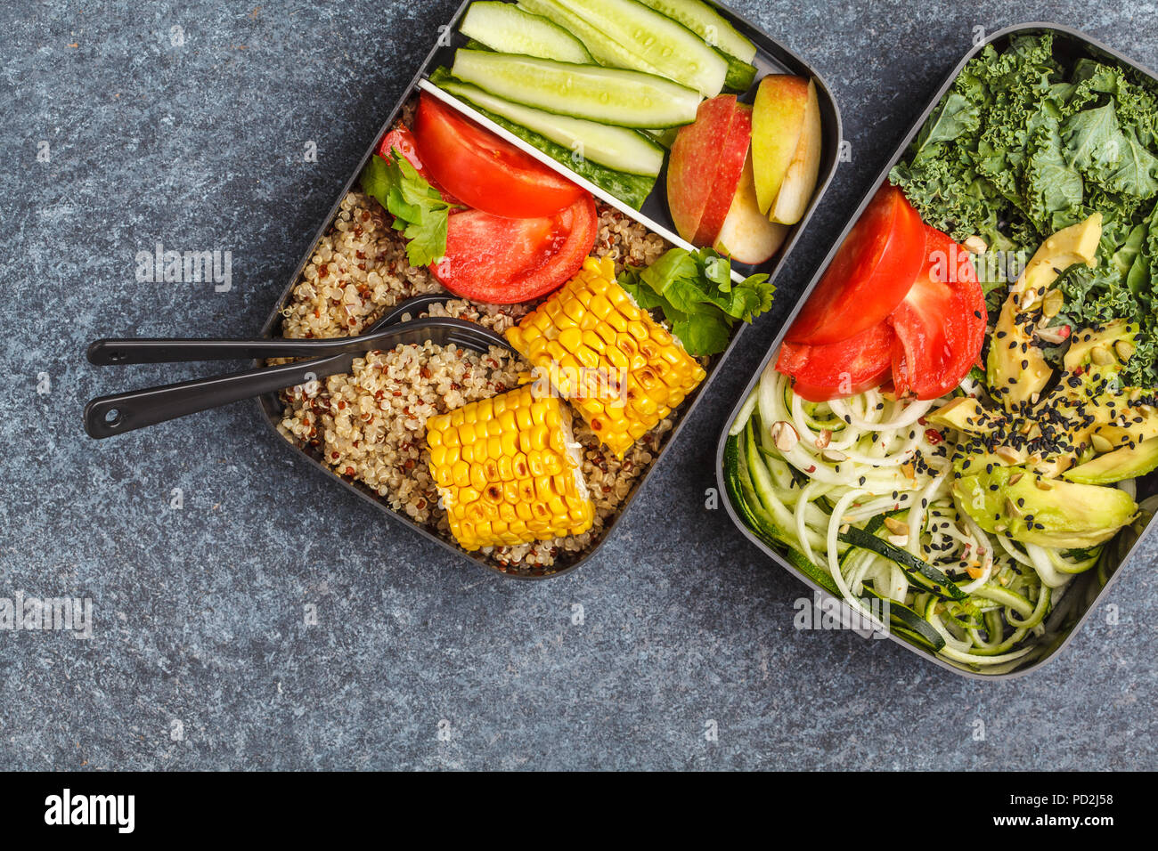 Healthy meal prep containers with quinoa, avocado, corn, zucchini