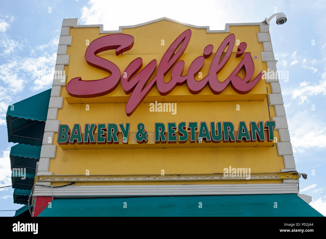 A sign outside Sybil's Bakery & Restuarant, a Guyanese business in Irchmond Hill that's been around for nearly 50 years. Stock Photo