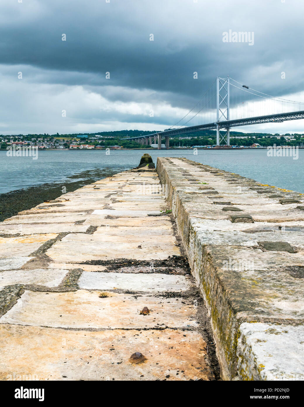 Old car ferry pier, North Queensferry, Firth of Forth, with Forth Road