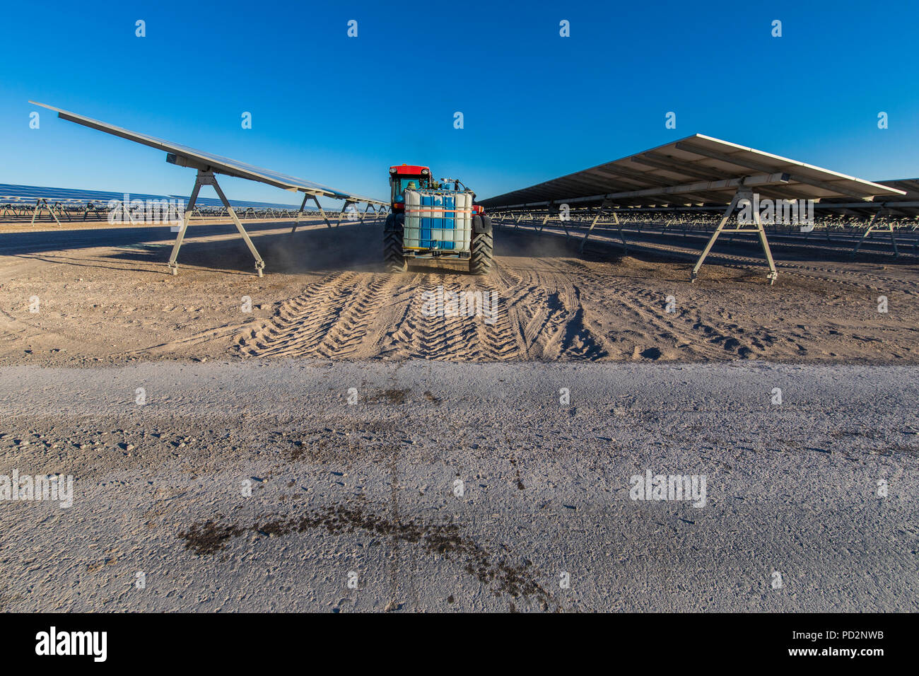 Machine cleaning PV modules, Solar Energy technology to reduce CO2 emissions and the best place for Solar Energy is the Atacama Desert at north Chile Stock Photo