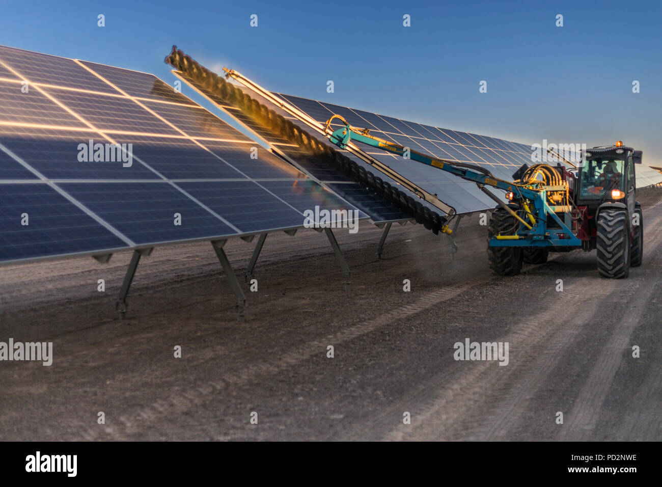 Machine cleaning PV modules, Solar Energy technology to reduce CO2 emissions and the best place for Solar Energy is the Atacama Desert at north Chile Stock Photo