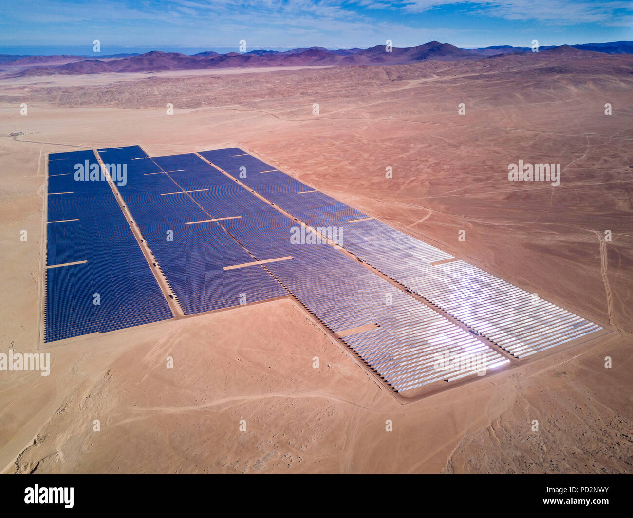 An aerial view of a Solar Energy PV Plant over the Atacama desert in Chile, trying to get the energy from the sun with Solar Energy Stock Photo