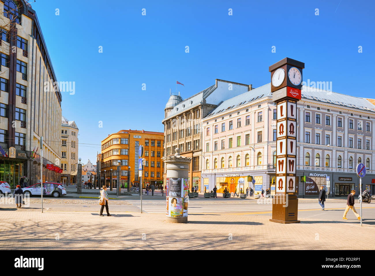 Riga, Latvia - April 12, 2018: The Laima watches (Laimas pulkstenis) are  street watches of the original tower design located in the center of Riga  Stock Photo - Alamy