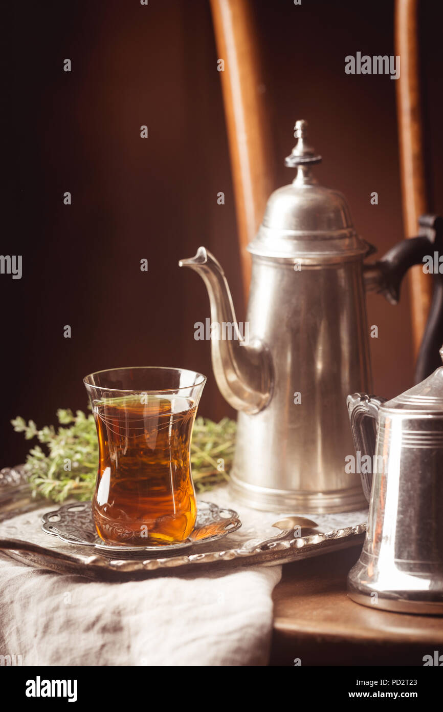 Turkish tea in traditional glass with kettle on metal tray Stock Photo ...