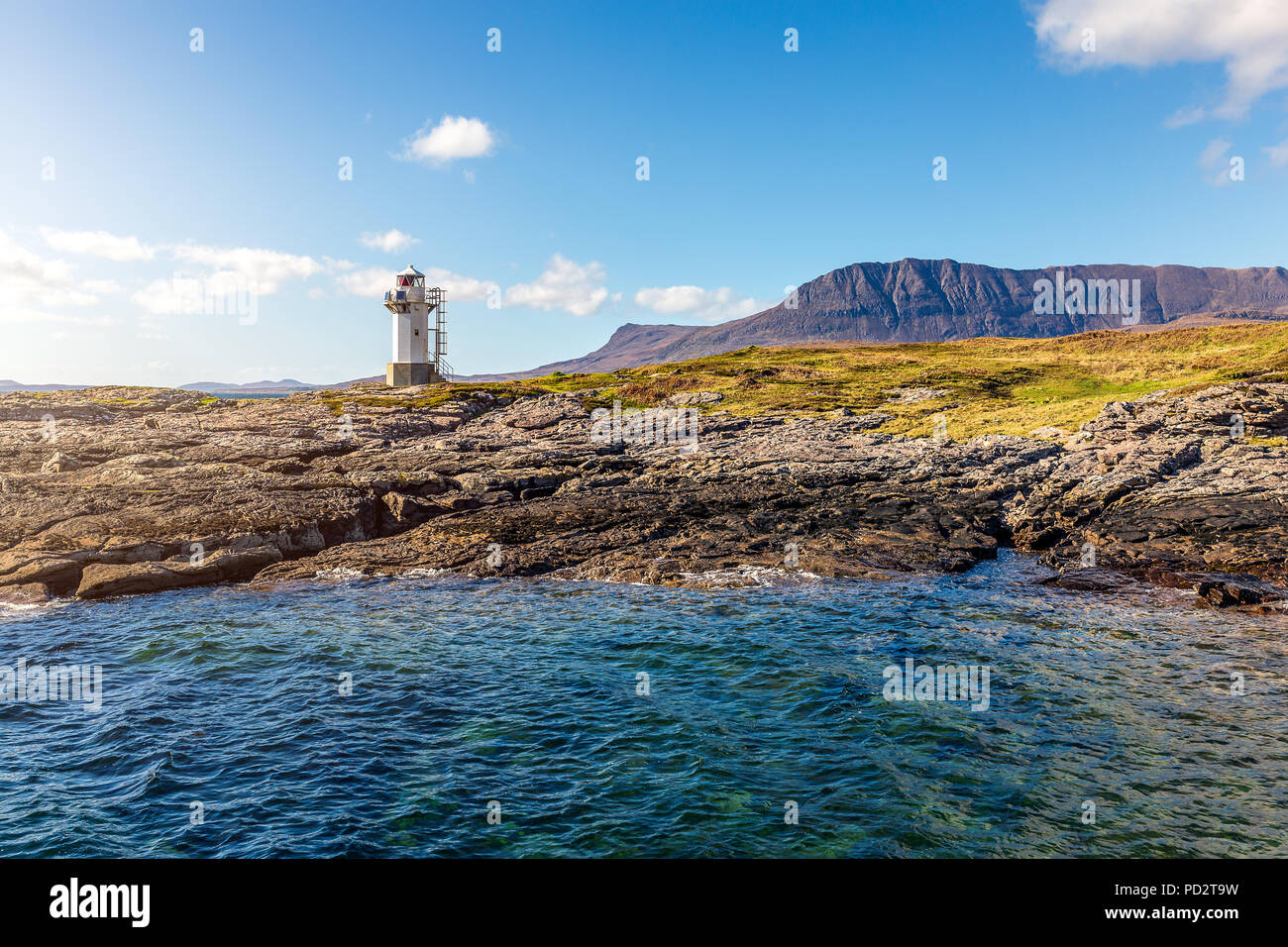Rhue Lighthouse at the entrance of Loch Broom Stock Photo