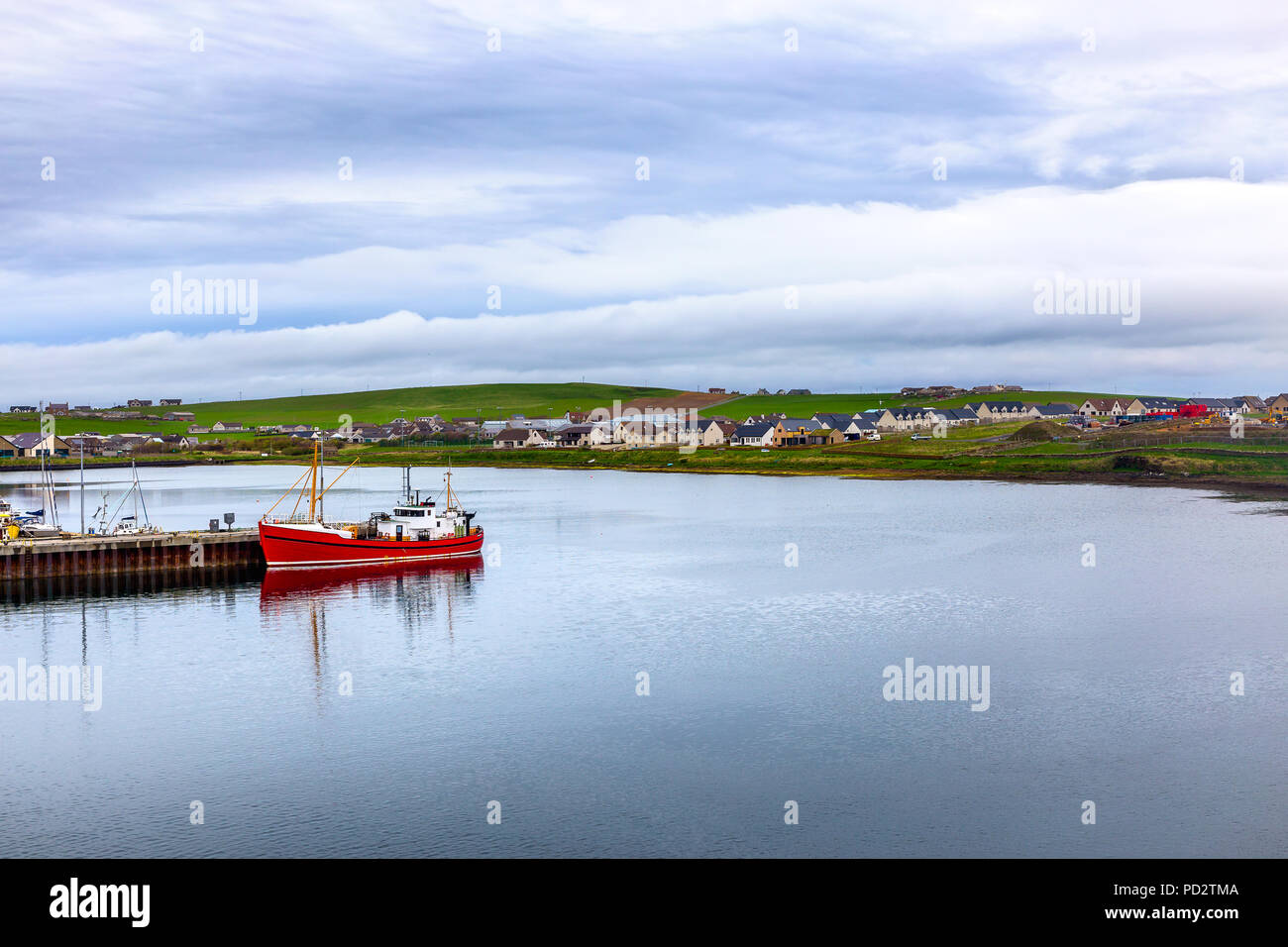 A ship in the harbor of Stromness Stock Photo