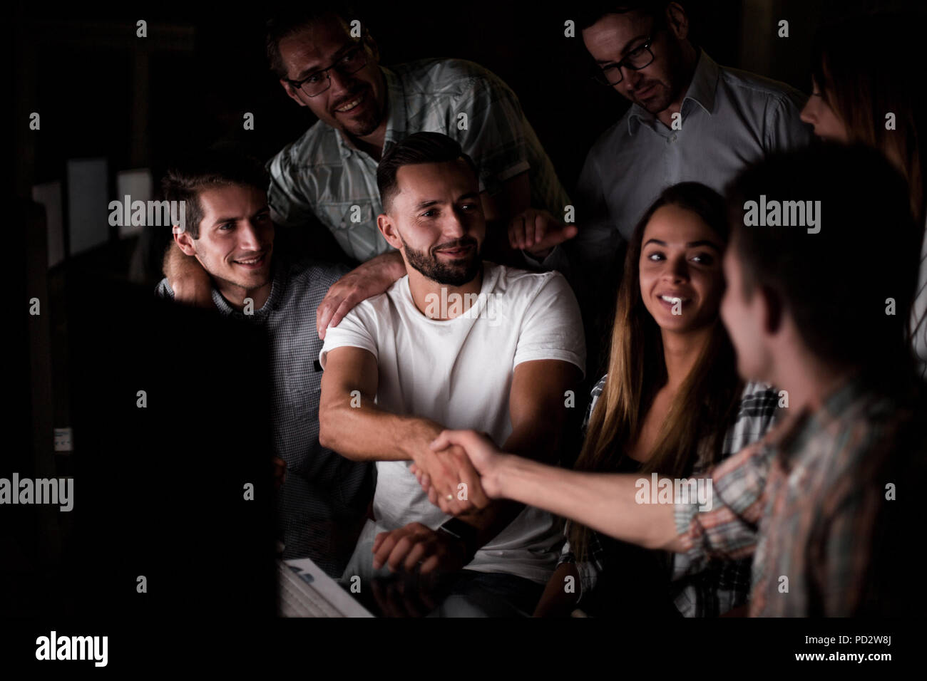 handshake of employees at the working meeting Stock Photo - Alamy
