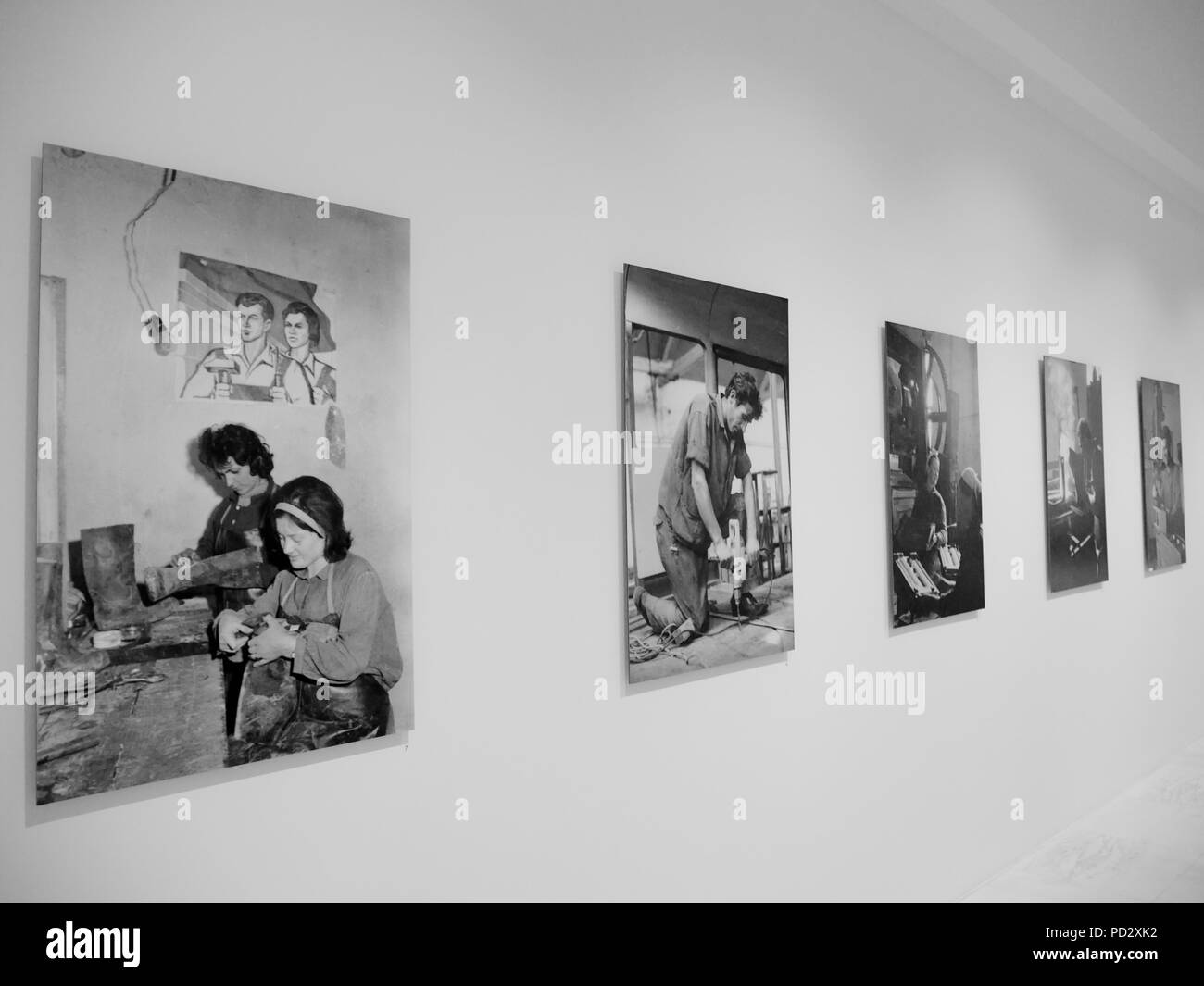 Black and white photos depicting hard working life in the communist era in exhibition at Marubi National Museum of Photography, Shkoder, Albania. Stock Photo