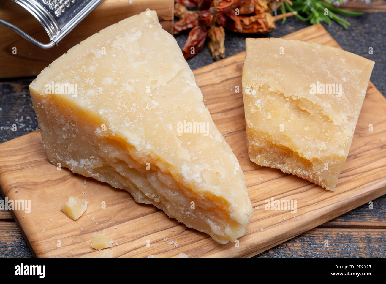 https://c8.alamy.com/comp/PD2Y25/traditional-italian-food-36-months-aged-in-caves-italian-parmesan-hard-cheese-from-parmigiano-reggiano-italy-PD2Y25.jpg