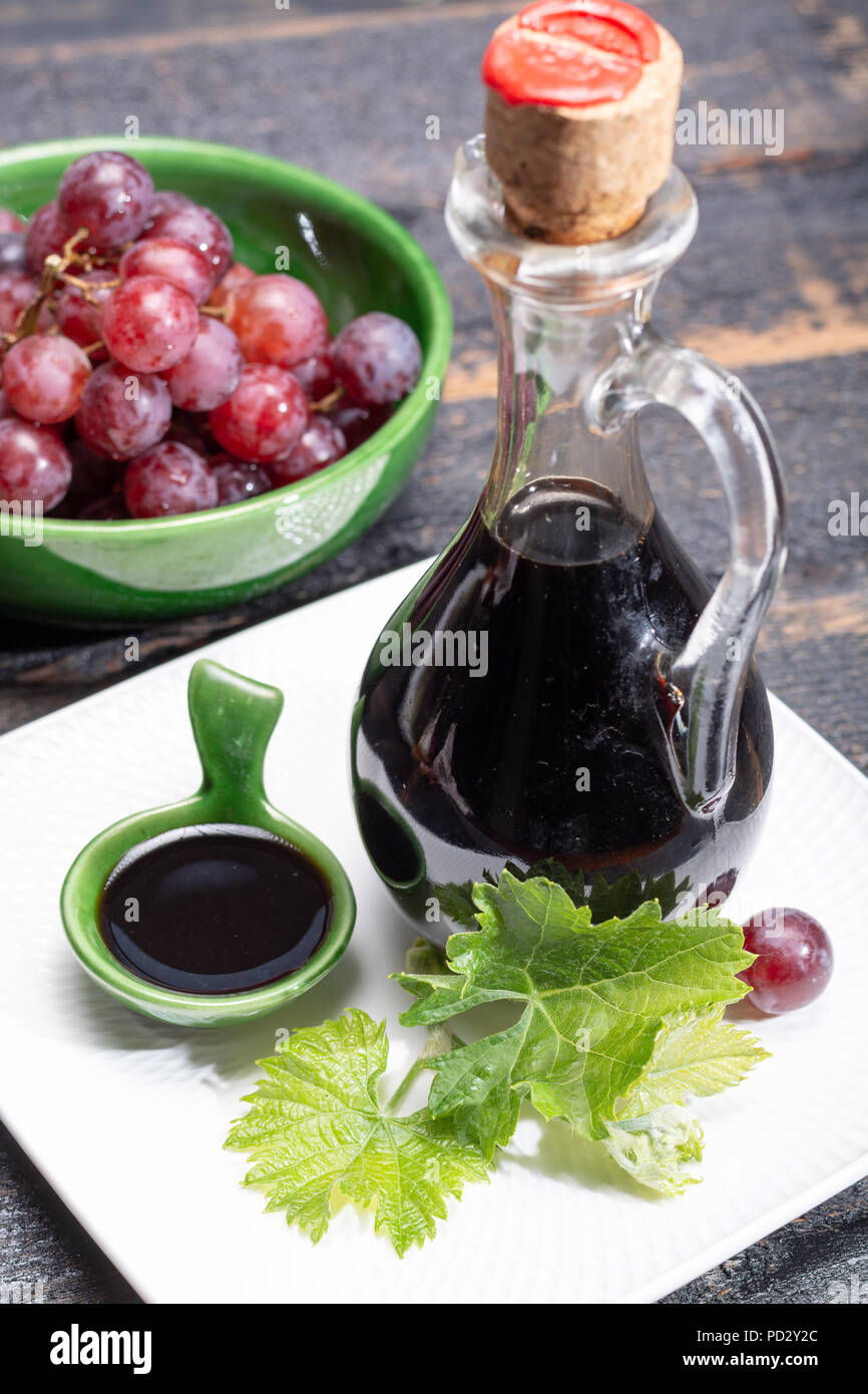 Black aged natural balsamic vinegar dressing from Modena, Italy Stock