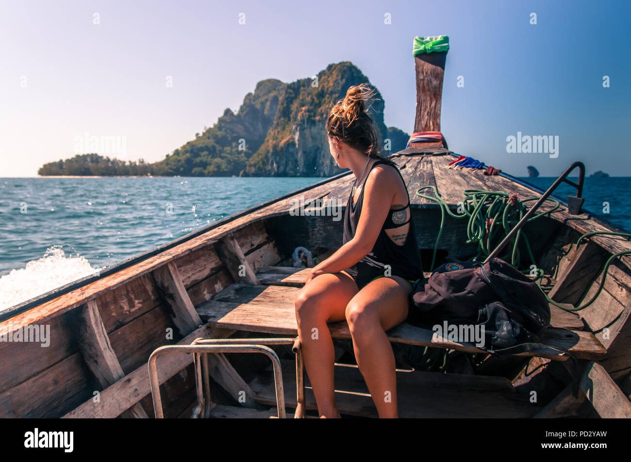 Woman enjoying boat ride, Tonsai, Krabi, Thailand Stock Photo