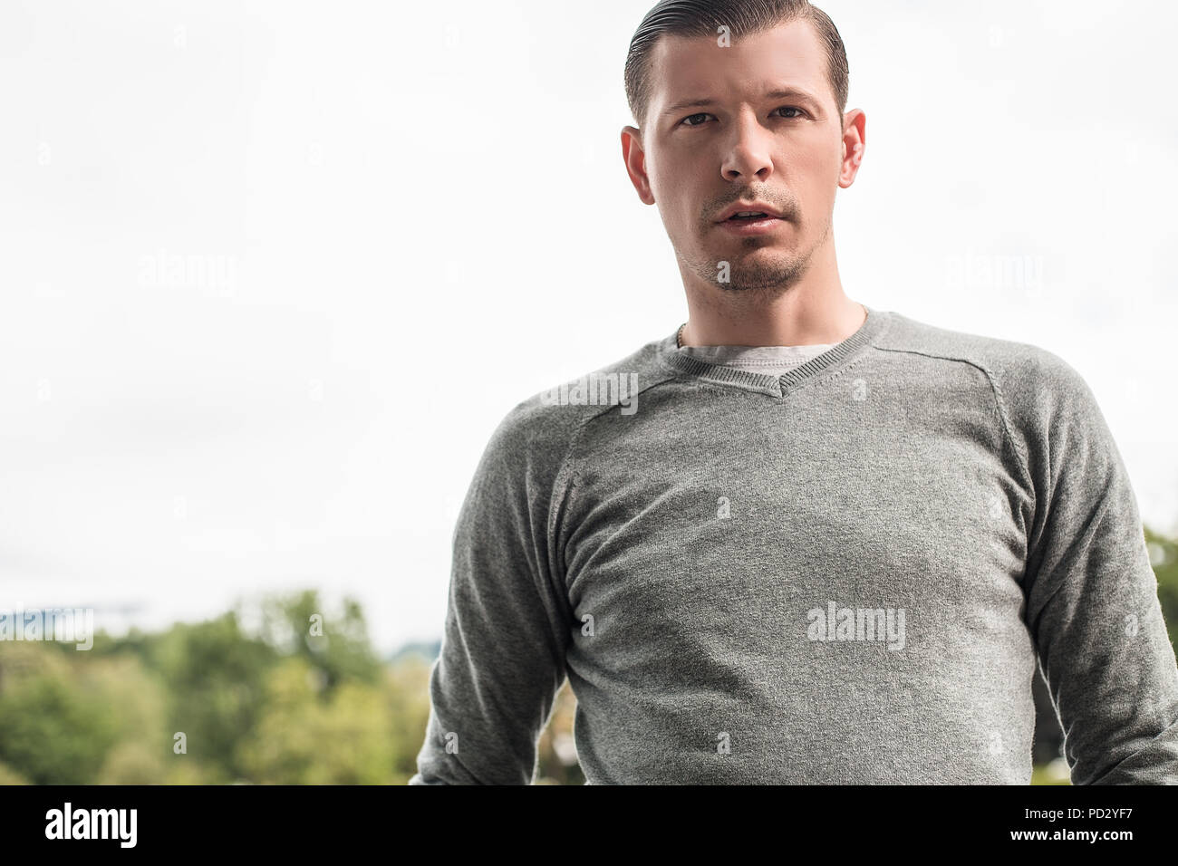 Grey sweatshirt hi-res stock photography and images - Alamy