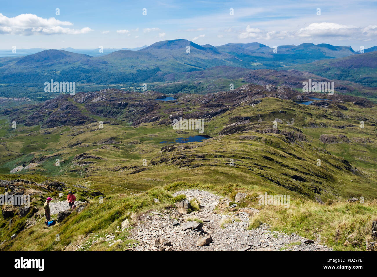 View from Cnicht mountain to distant Moel Hebog and Nantlle Ridge mountains on skyline in Snowdonia National Park. Croesor Gwynedd Wales UK Britain Stock Photo