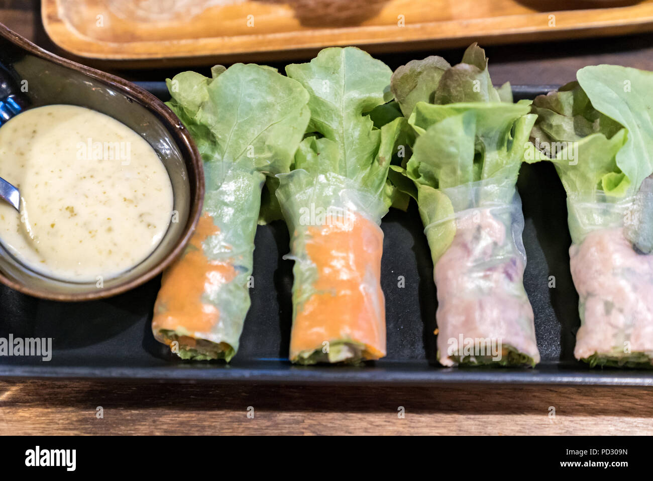 Salad rolls with dipping sauce Stock Photo