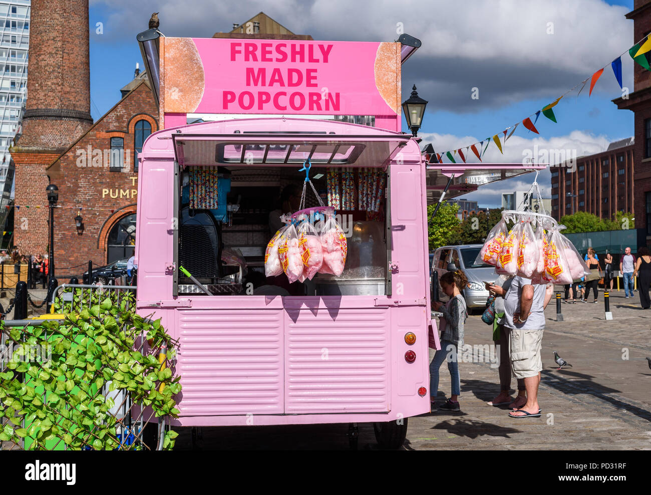 Freshly made popcorn and candy floss being sold at Albert Dock, Liverpool, England,Uk. Stock Photo