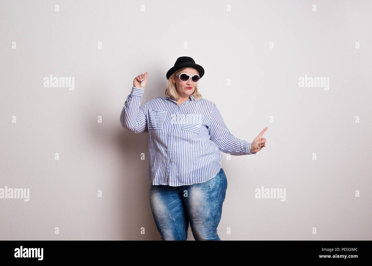Fat and woman and jeans and obese hi-res stock photography and