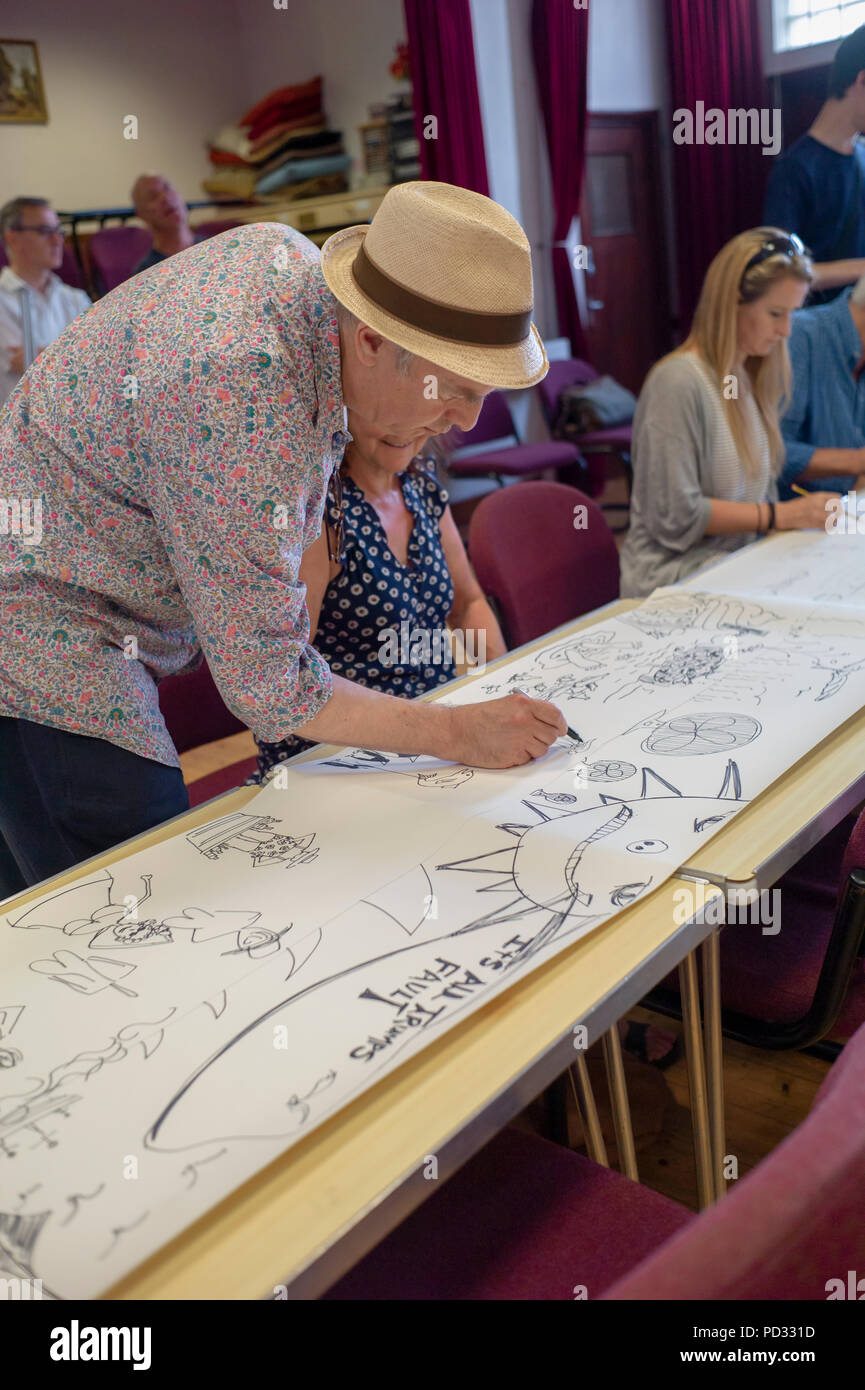 Martin Rowson internationally renowned cartoonist taking a masterclass in  caricature at Herne Bay Cartoon Festival Stock Photo