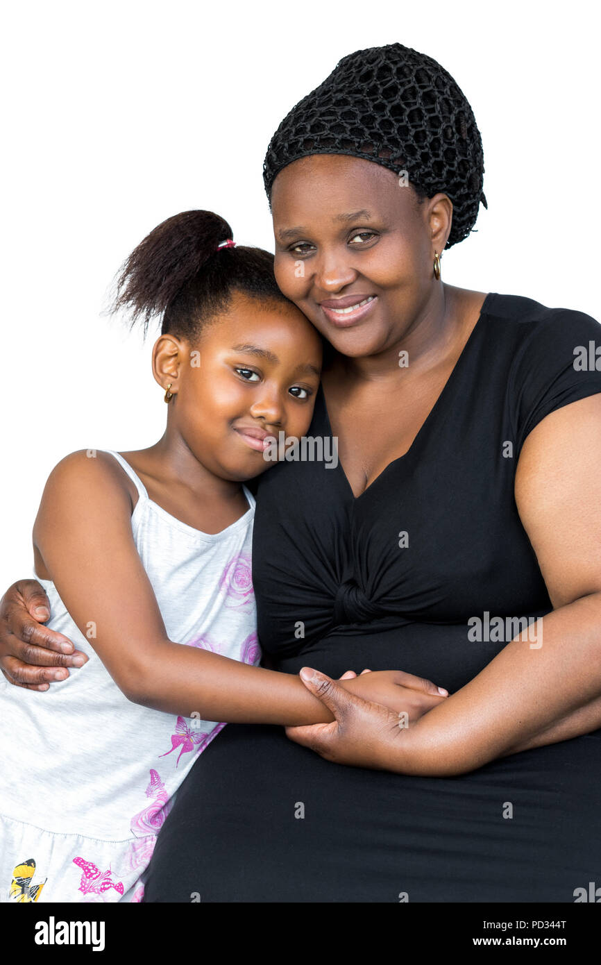 Close up portrait of little african child together with mother isolated on white background. Stock Photo