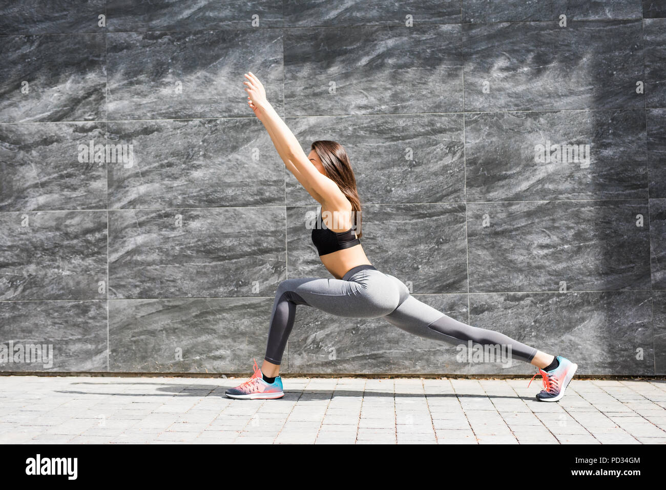 Stylish Attractive Young Female Runner In Black Sportswear Doing Warm Up Routine Outdoors Before Running Stretching Legs With Lunge Hamstring Stretch Stock Photo Alamy Stylish Attractive Young Female Runner In Black Sportswear Doing Warm Up Routine Outdoors Before Running Stretching Legs With Lunge Hamstring Stretch Stock Photo Alamy