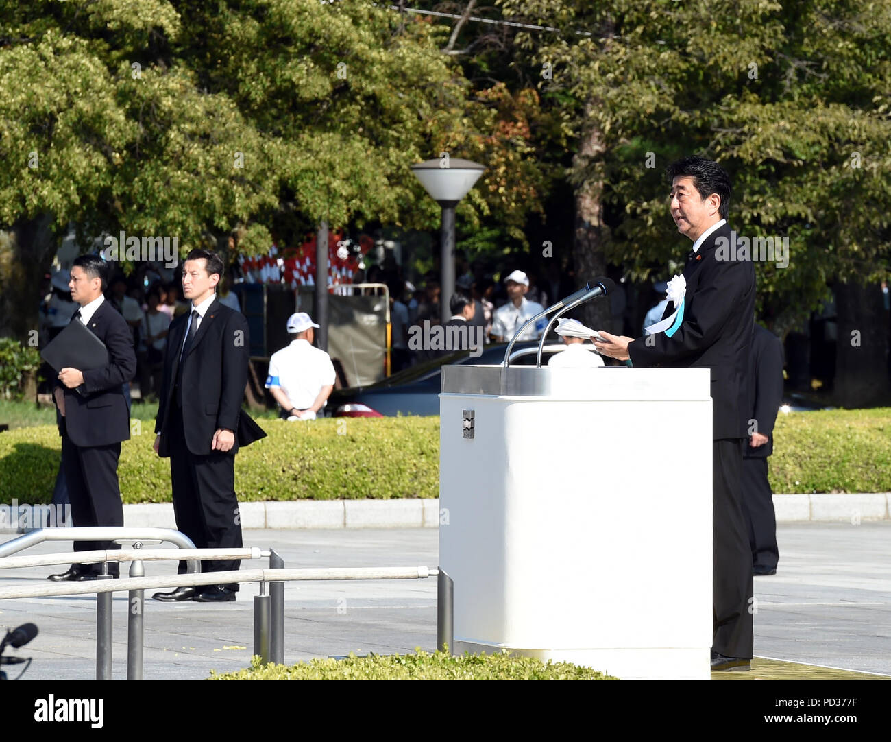 Hiroshima. 6th Aug, 2018. Japanese Prime Minister Shinzo Abe (Front) speaks during a ceremony commemorating the 73rd anniversary of the atomic bombing of Hiroshima at the Peace Memorial Park in Hiroshima, Japan on Aug. 6, 2018. Credit: Ma Ping/Xinhua/Alamy Live News Stock Photo
