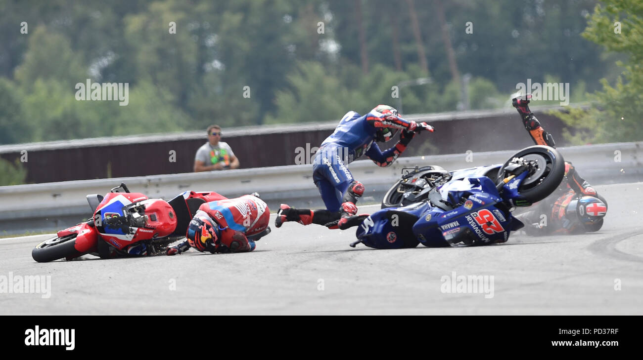 Brno, Czech Republic. 05th Aug, 2018. From left STEFAN BRADL of Germany,  MAVERICK VINALES of Spain and BRADLEY SMITH of Great Britain crash in first  turn of Grand Prix of the Czech