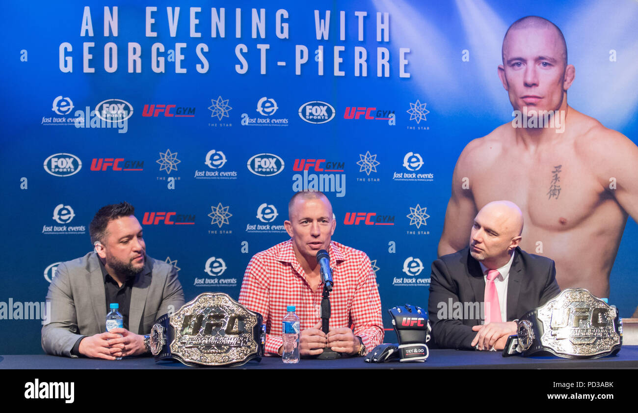 Sydney, Australia. 6th Aug, 2018. Ultimate Fighting Championship(UFC) player George St-Pierre (C) attends a press conference in Sydney, Australia, on Aug. 6, 2018. St-Pierre will give three speeches in Sydney, Melbourne and Brisbane this week to share the lessons he learned in mixed matrial arts. Credit: Zhu Hongye/Xinhua/Alamy Live News Stock Photo