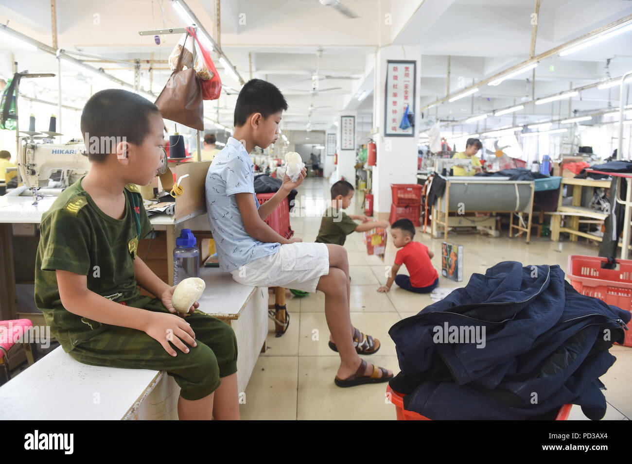 Shishi China S Fujian Province 1st Aug 18 Children Have Breakfast At A Clothing Factory Where Their Parents Work In Shishi City Southeast China S Fujian Province Aug 1 18 Shishi A Well Known Clothing Shishi China S Fujian Province 1st Aug 18 Children Have Breakfast At A Clothing Factory Where Their Parents Work In Shishi City Southeast China S Fujian Province Aug 1 18 Shishi A Well Known Clothing