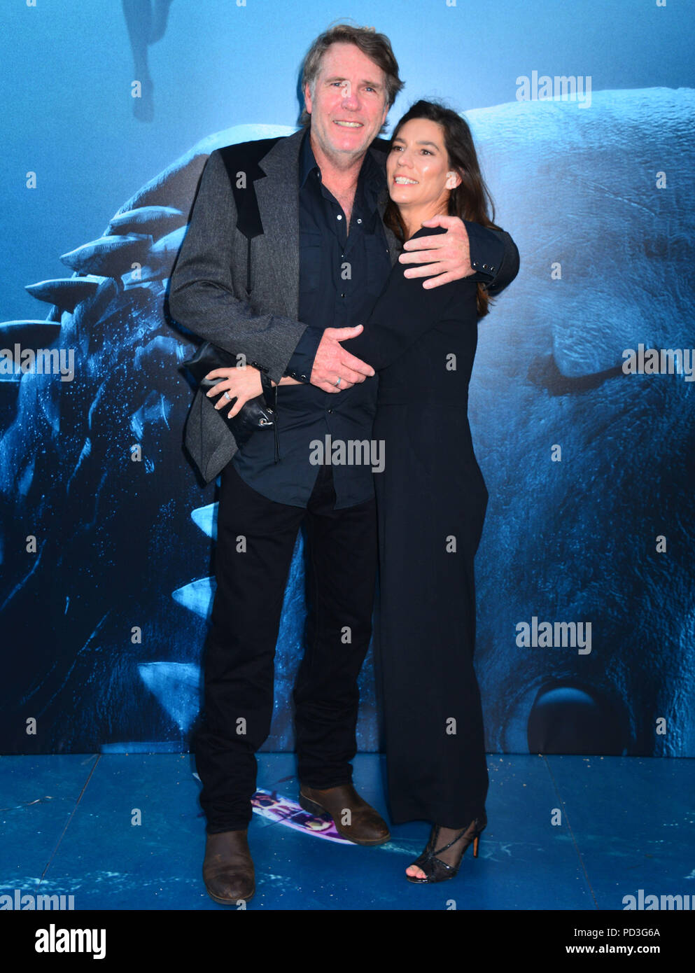 Robert Taylor and wife Ayisha Davies 089 attends the premiere of Warner