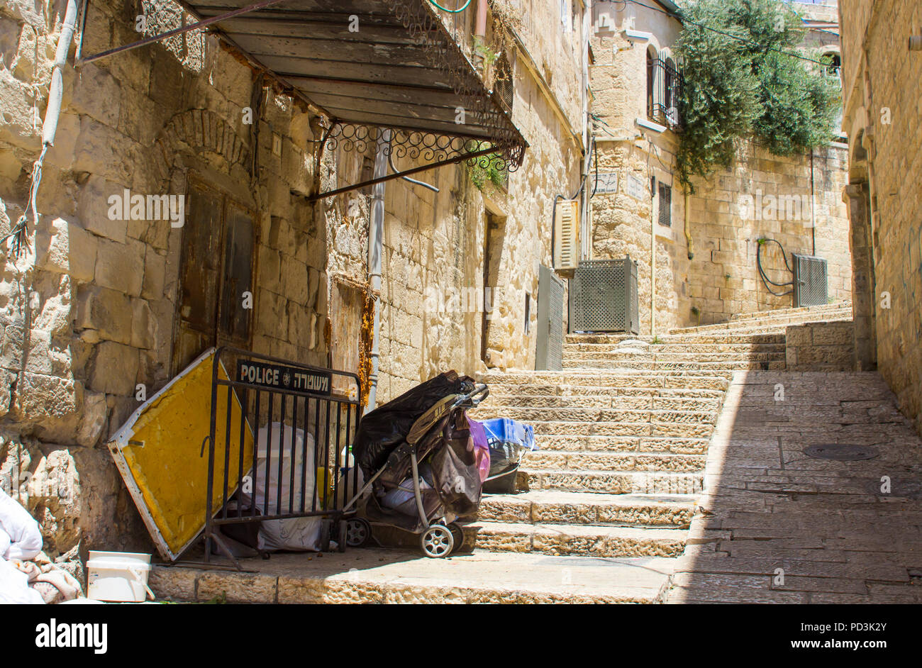 A narrow side street with rising steps off the Via Dolorosa in Jerusalem Israel Stock Photo