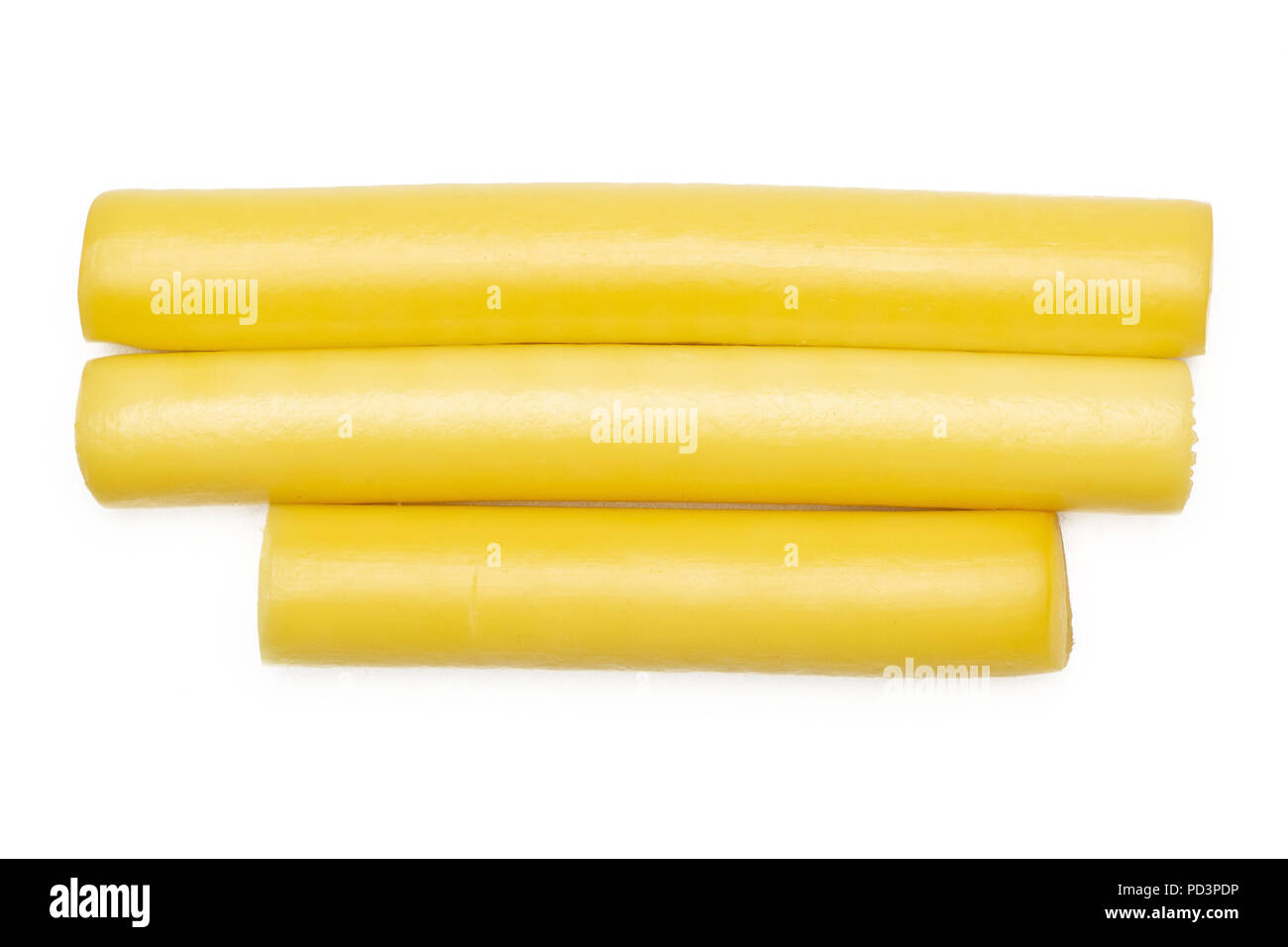 Group of three whole smoked slovak string cheese stick flatlay isolated
