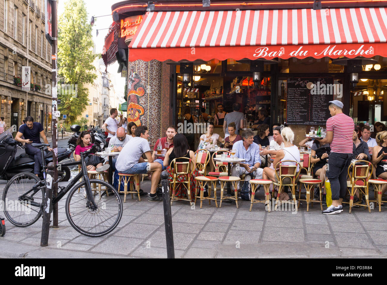 Paris cafe - Late afternoon at the Bar du Marche on Rue de Buci in the Saint Germain area of Paris, France, Europe. Stock Photo