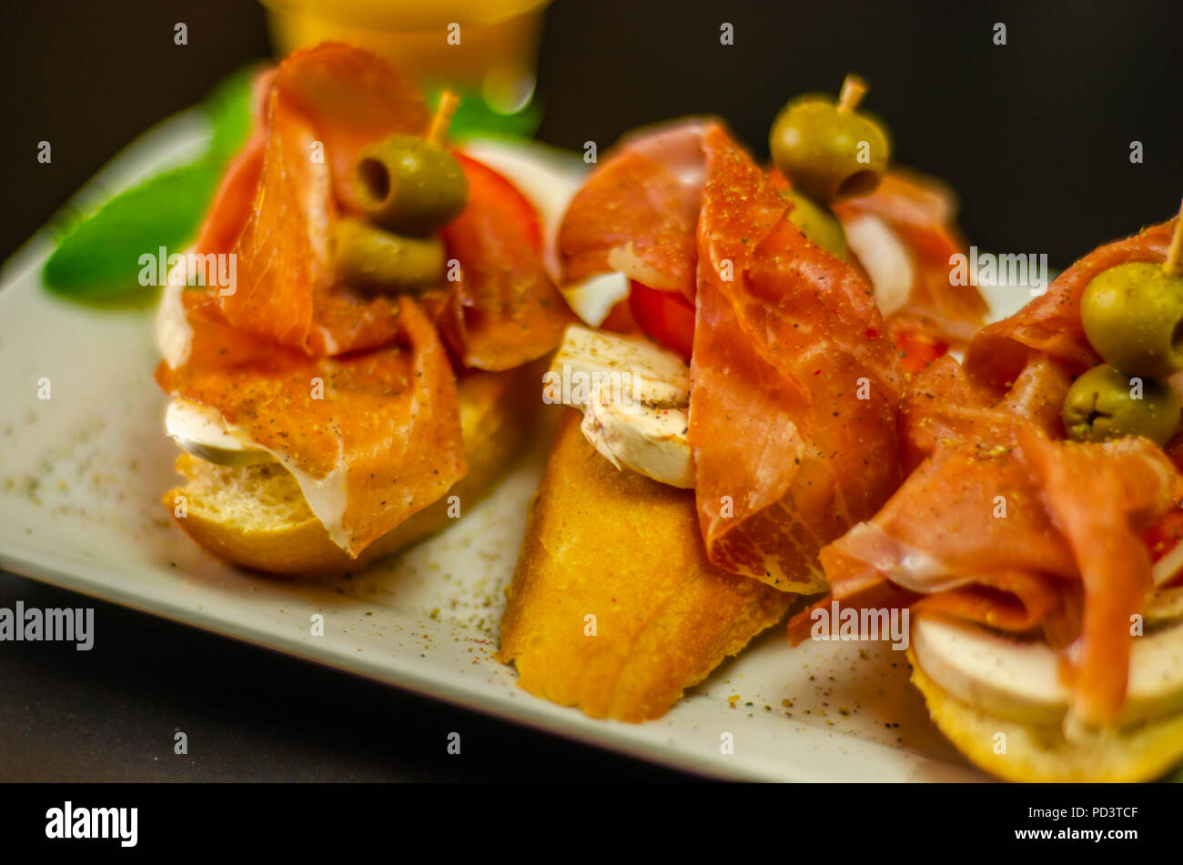 traditional spanish tapas for lunch table, mini sandwiches food set