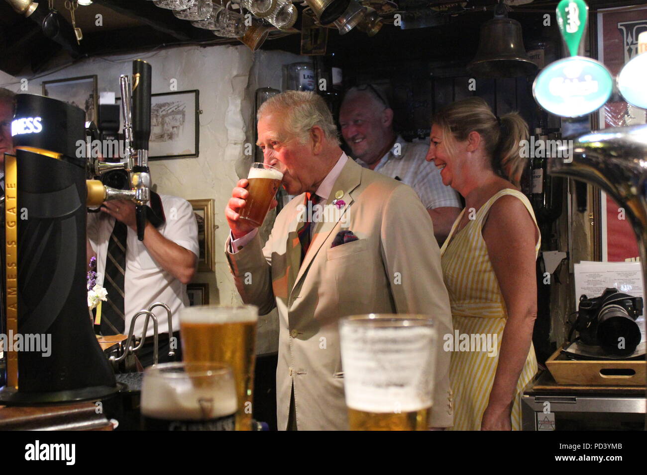 Prince Charles visits St Digain Church in Llangernyw in Wales and pops in The Old Stag pub for a quick pint, which he pours himself.  Featuring: Prince Charles Where: LLangernyw, United Kingdom When: 06 Jul 2018 Credit: WENN.com Stock Photo