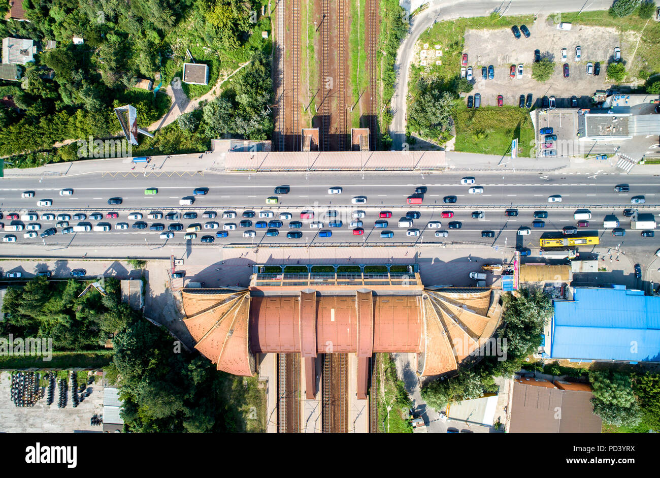 Top-down view of a road bridge crossing a railway. Karavaevi Dachi, Kiev, Ukraine Stock Photo