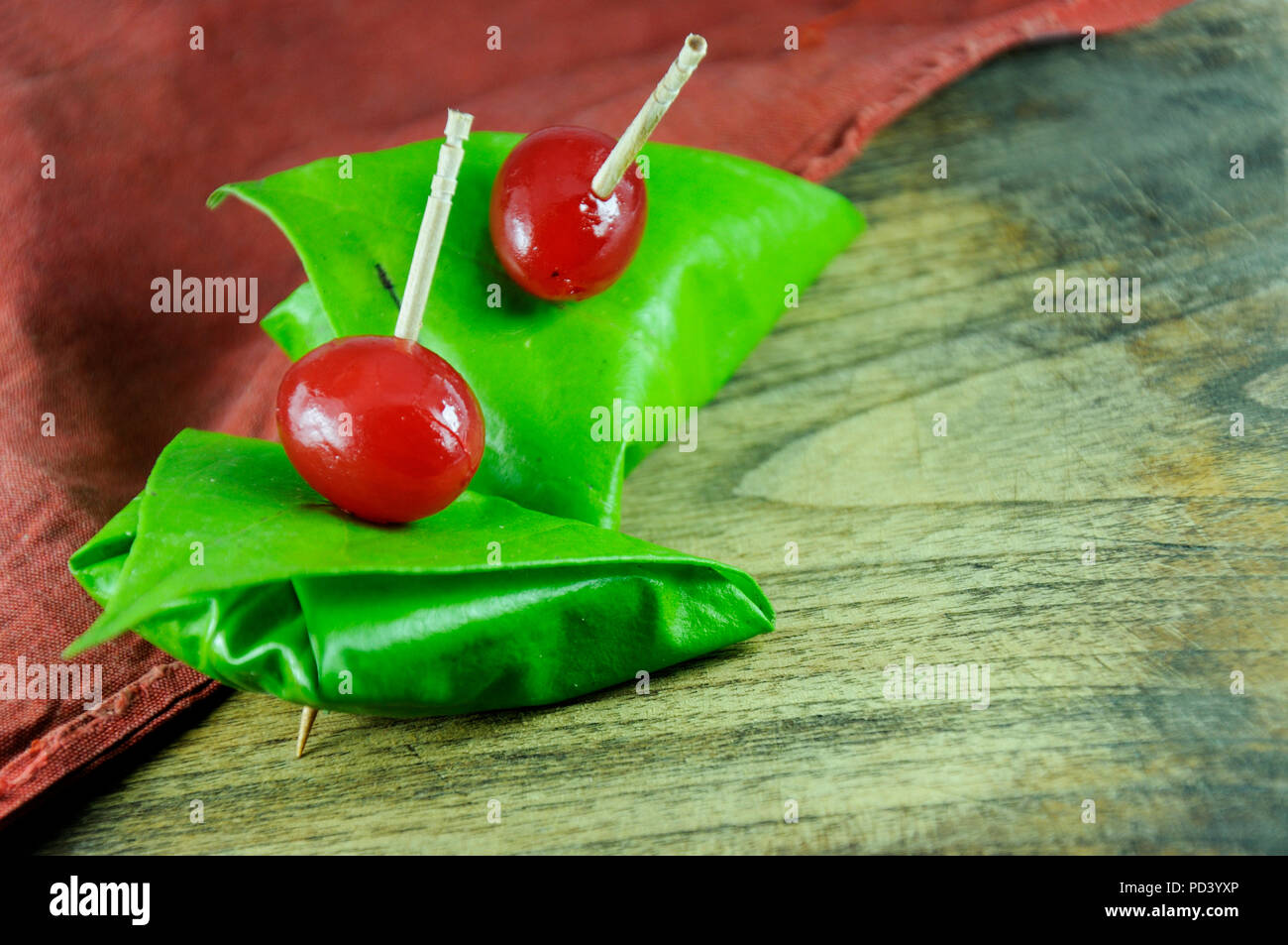 sweet paan wrapped in betel leaf, often used as an after dinner digestive. Stock Photo