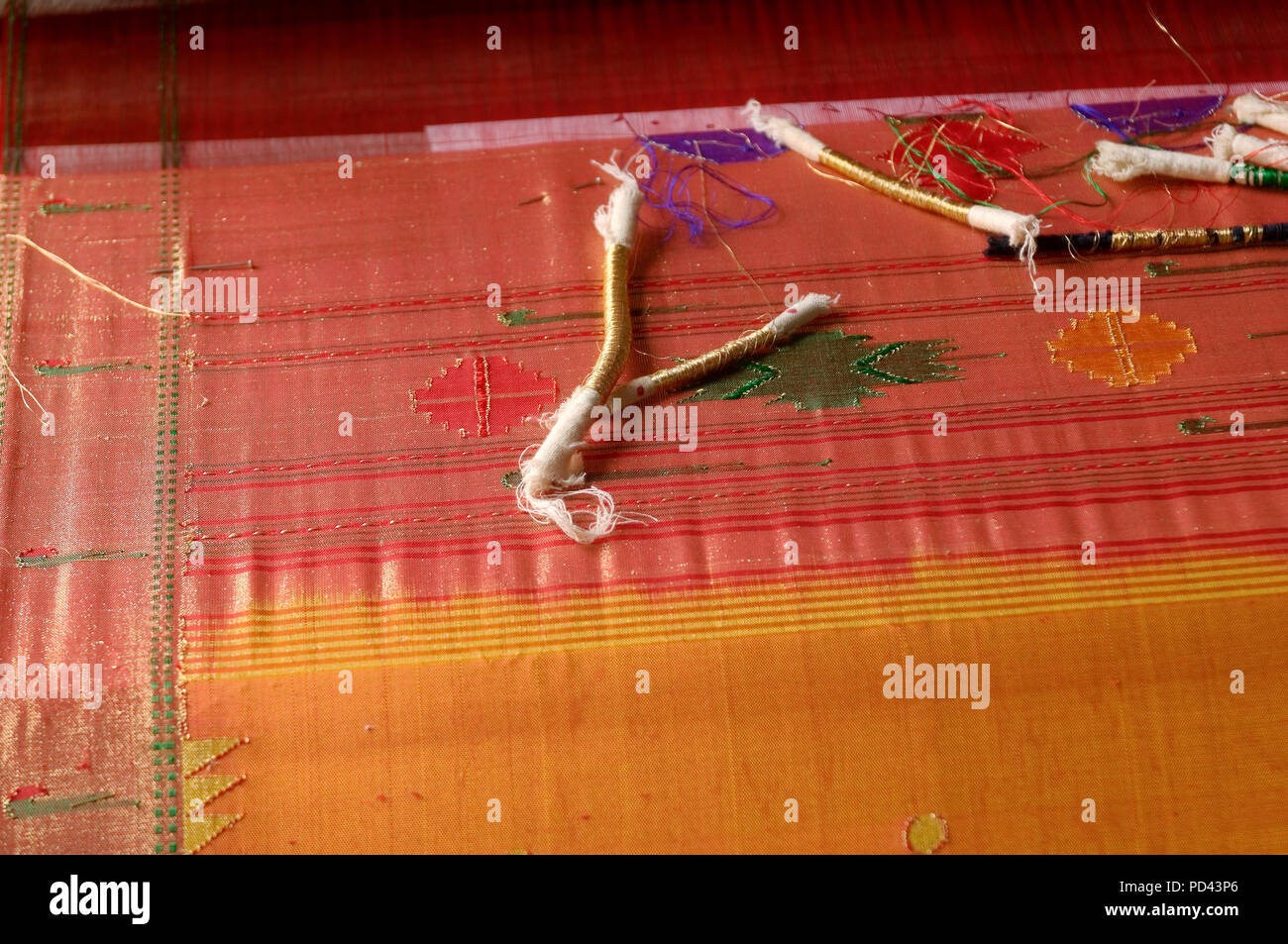 weaving of silk threads with gold thread a speciality of town Paithan