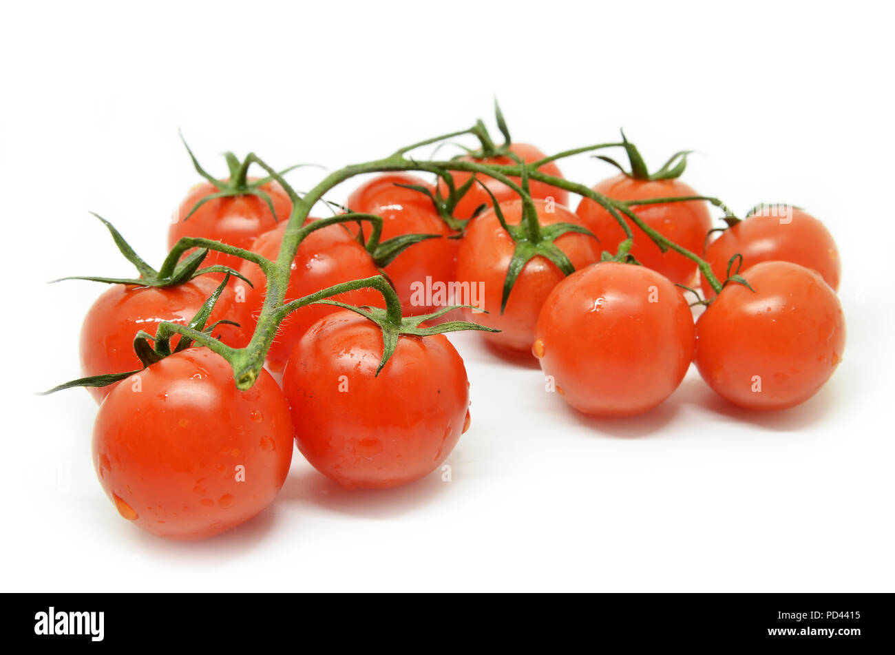 Red cherry tomato isolated on white background Stock Photo - Alamy