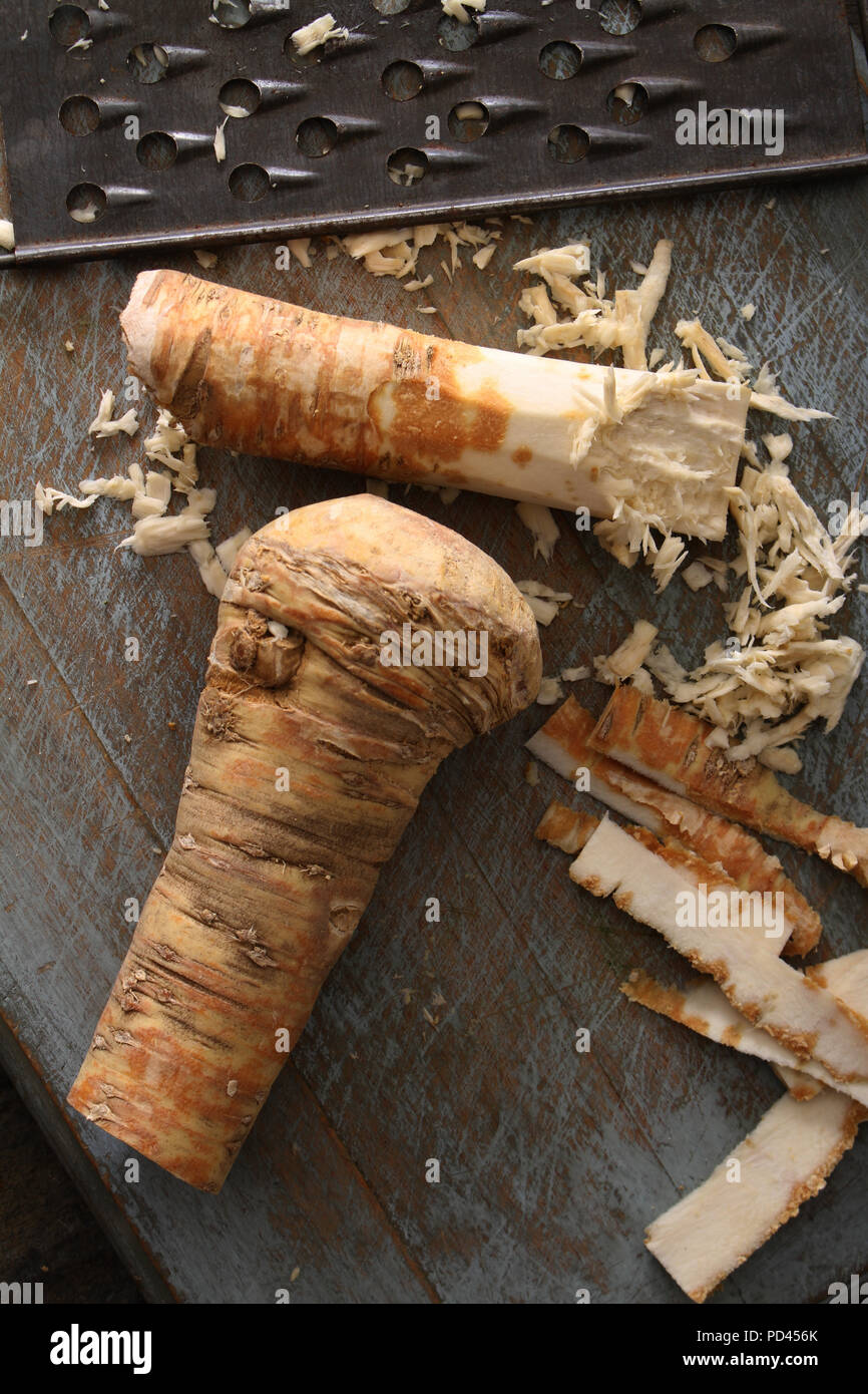 grating fresh horseradish root Stock Photo - Alamy